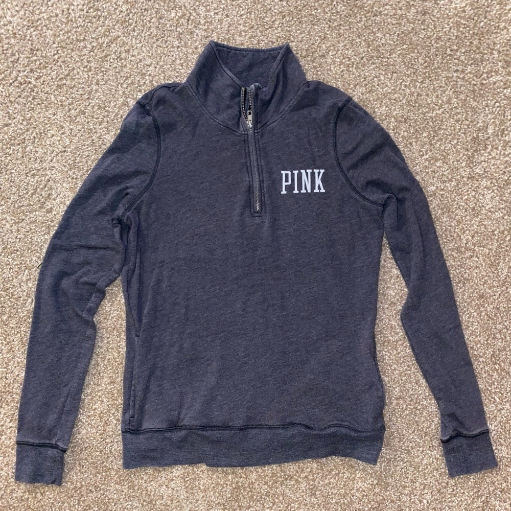 Pink quarter zip sweater.